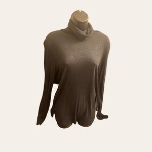 Ana black top with specs of silver sparkle all over.